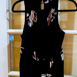 Size medium , a new day brand romper . Worn once!